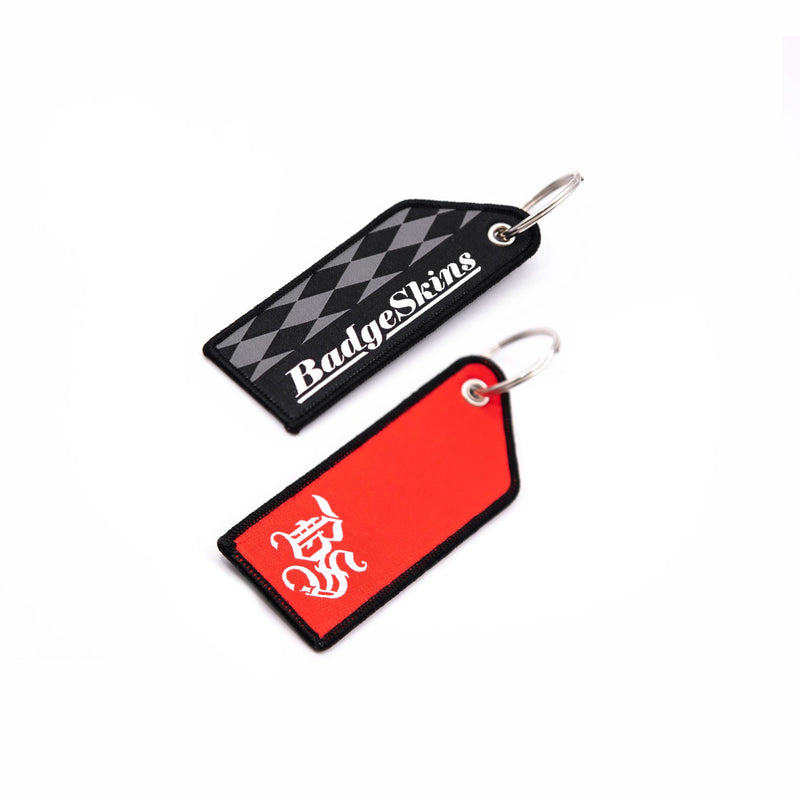 Load image into Gallery viewer, Badgeskins Old English Checkered Jet Tag