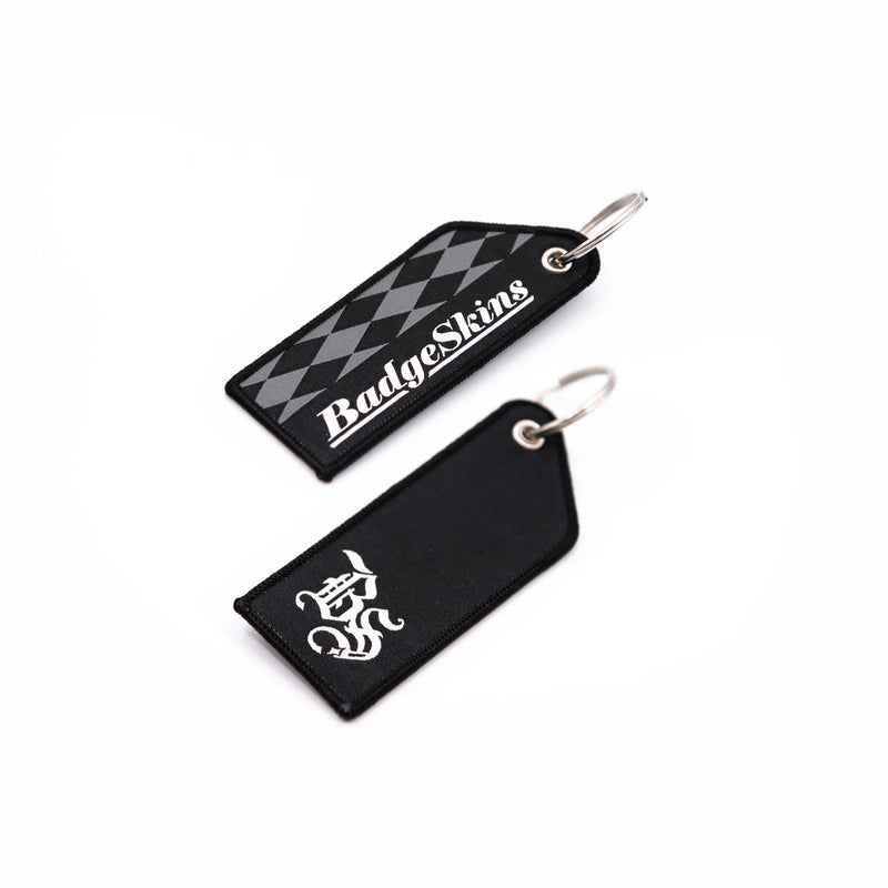 Load image into Gallery viewer, Badgeskins Old English Checkered Jet Tag